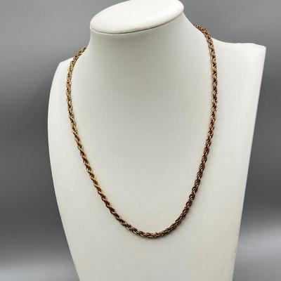 LOT 188: Collection of Gold Toned Necklaces Including One with Large Flower Pendant