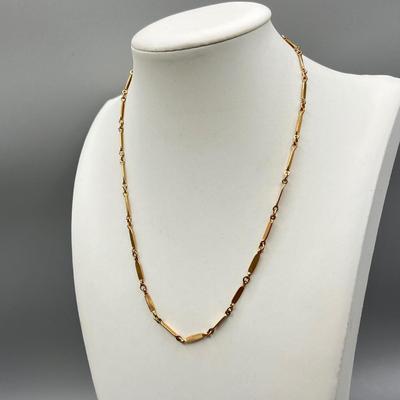 LOT 188: Collection of Gold Toned Necklaces Including One with Large Flower Pendant