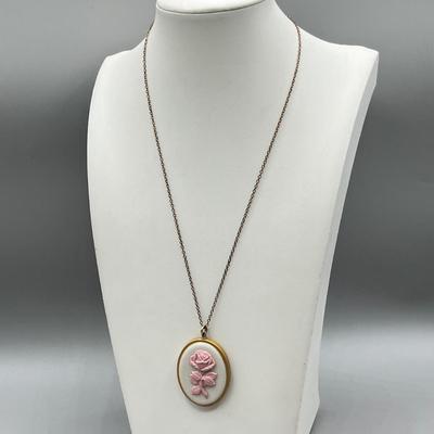 LOT 188: Collection of Gold Toned Necklaces Including One with Large Flower Pendant