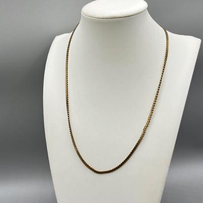 LOT 188: Collection of Gold Toned Necklaces Including One with Large Flower Pendant