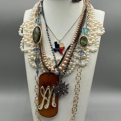 LOT 197J: Necklace Collection Including Texas Pendant and Large "M" Bamboo Pendant