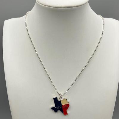 LOT 197J: Necklace Collection Including Texas Pendant and Large "M" Bamboo Pendant