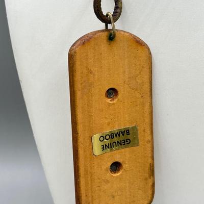 LOT 197J: Necklace Collection Including Texas Pendant and Large "M" Bamboo Pendant