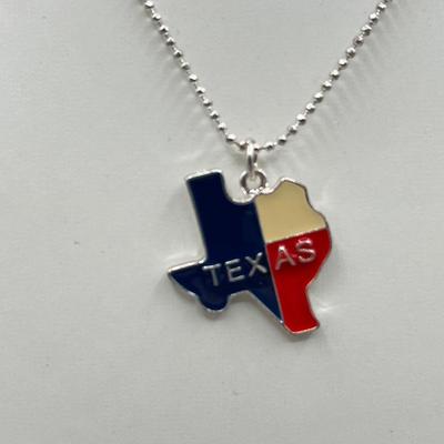 LOT 197J: Necklace Collection Including Texas Pendant and Large "M" Bamboo Pendant