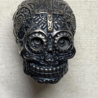 Silver skull pendant on chain