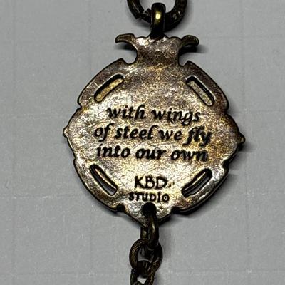 KBD studio NY Transit token & bird pendant