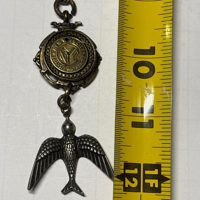 KBD studio NY Transit token & bird pendant