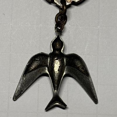 KBD studio NY Transit token & bird pendant