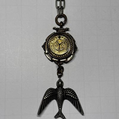 KBD studio NY Transit token & bird pendant