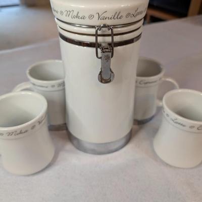 Sale Photo Thumbnail #78: Set of 4 Coffee cups w/ matching canister and holder. Dishwasher safe 
canister 10" tall x 5" wide
