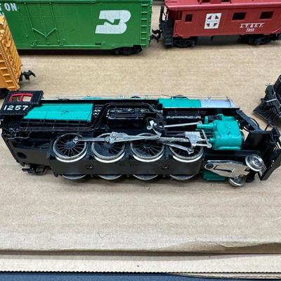 Vintage HO Scale Model Train Lot – Locomotives, Freight Cars, Track & Power Packs. HO Scamm