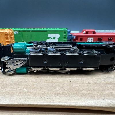Vintage HO Scale Model Train Lot – Locomotives, Freight Cars, Track & Power Packs. HO Scamm