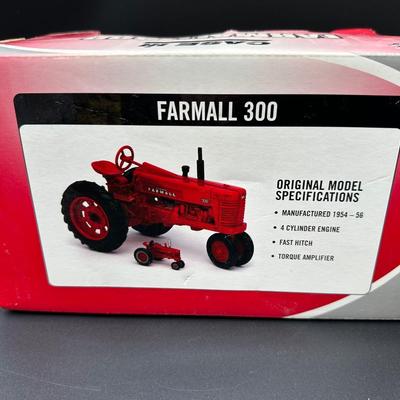 (2) ERTL 1/16 Scale Die-Cast Farm Tractors – Farmall 300 Case IH & 1939 John Deere Model H – Boxed