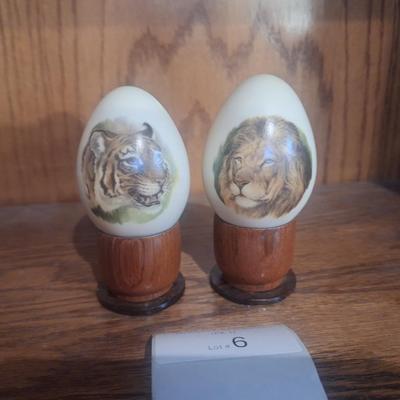 eggs on stand with tiger and lion design