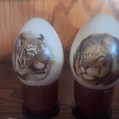 eggs on stand with tiger and lion design