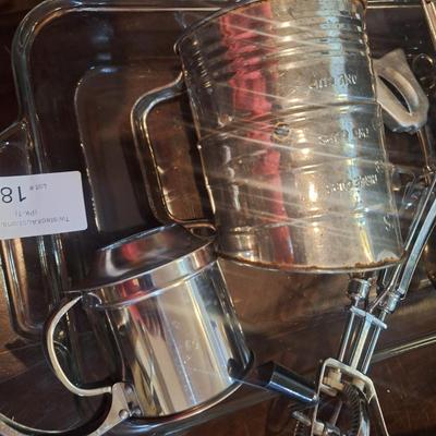 Cake pan, flour sifter, egg beater, cheese grater and other items