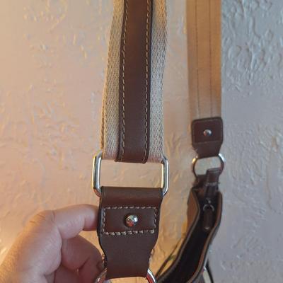 Chaps floral canvase crossbody bag with faux leather trim.