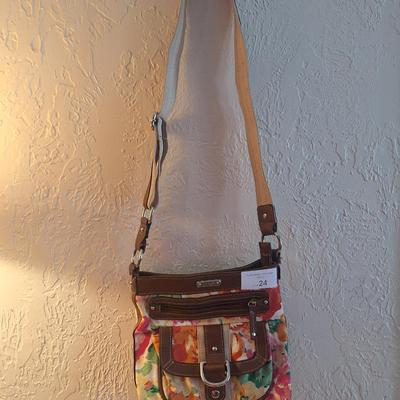 Chaps floral canvase crossbody bag with faux leather trim.