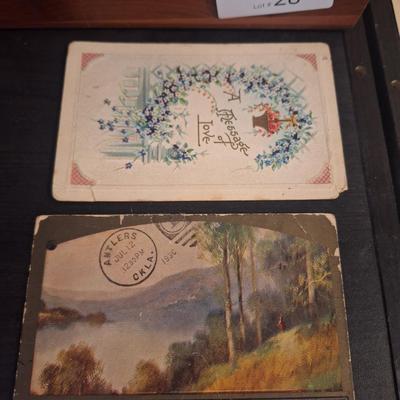 lane cedar chest like the ones given as high school graduation gift and 6 vintage post cards.  The ones with people are blank on back the...
