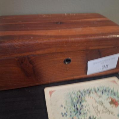 lane cedar chest like the ones given as high school graduation gift and 6 vintage post cards.  The ones with people are blank on back the...