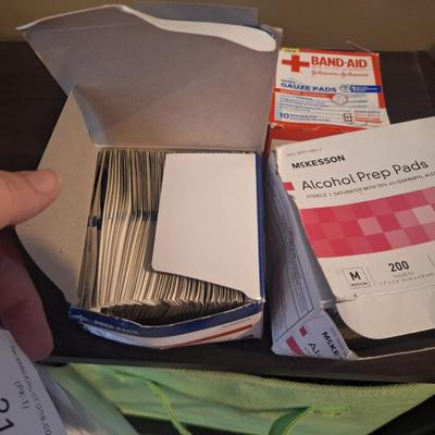 bundle of alcohol prep pads and some gauze pads