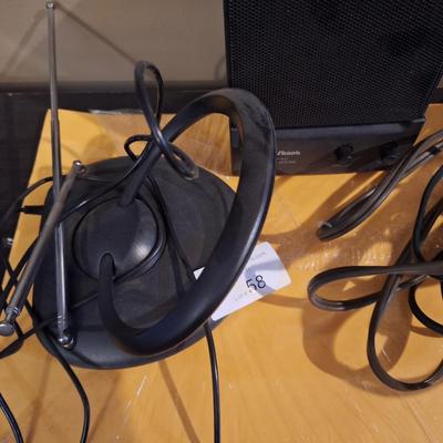 mini speaker, an ext cord and rabbit ears antenna