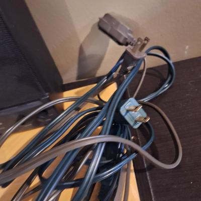 mini speaker, an ext cord and rabbit ears antenna