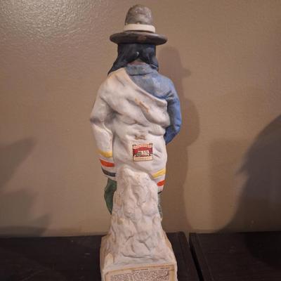 Lionstone "Proud Indian" (or "Casual Indian") porcelain whiskey decanter. -empty