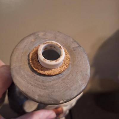 Lionstone "Proud Indian" (or "Casual Indian") porcelain whiskey decanter. -empty