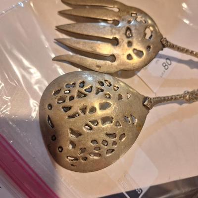 vintage set of ornate, silver-plated serving utensils  see all photos these have a brass color that is noticable in last photos.