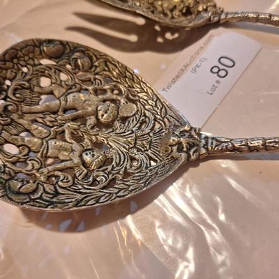 vintage set of ornate, silver-plated serving utensils  see all photos these have a brass color that is noticable in last photos.