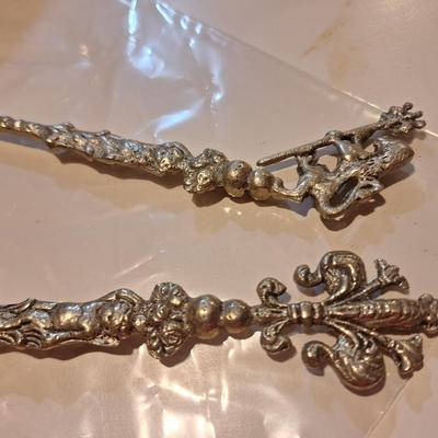 vintage set of ornate, silver-plated serving utensils  see all photos these have a brass color that is noticable in last photos.