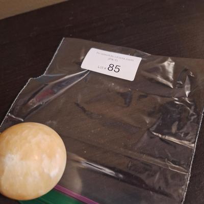 polished stone ball…calcite, onyx…we aren't sure the type of stone.