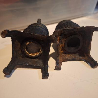 vintage cast iron miniature pot belly stoves- salt and pepper shakers