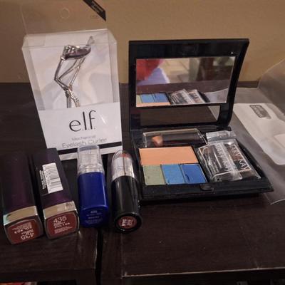 cosmetics bundle, elf eyelash curler, mary kay compact and varios other items