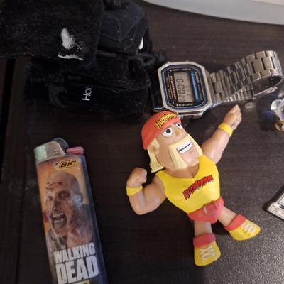 Hulk Hogan mini Funko figure and random other small items.