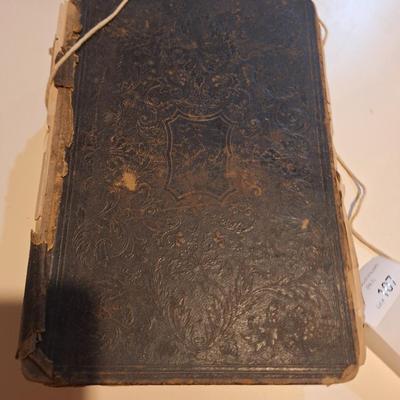 This is a WELL used large bible, has to be tied with string to hold the cover.  See all photos.