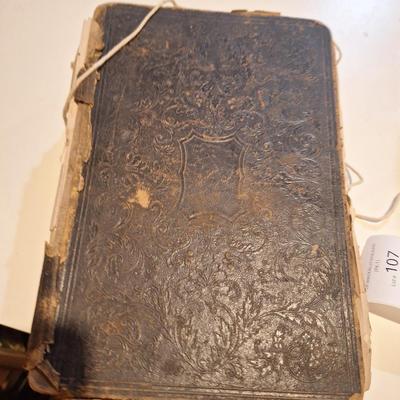 This is a WELL used large bible, has to be tied with string to hold the cover.  See all photos.