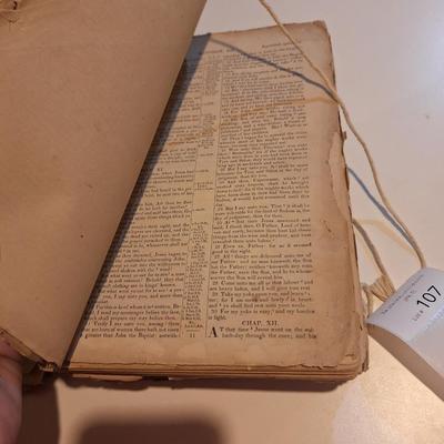 This is a WELL used large bible, has to be tied with string to hold the cover.  See all photos.