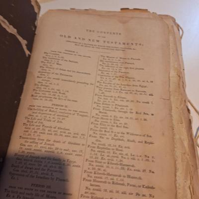 This is a WELL used large bible, has to be tied with string to hold the cover.  See all photos.