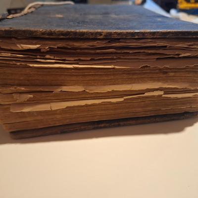 This is a WELL used large bible, has to be tied with string to hold the cover.  See all photos.