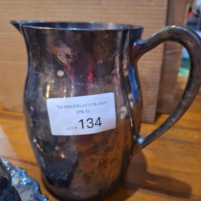 silver-plate pitcher and gravy boat