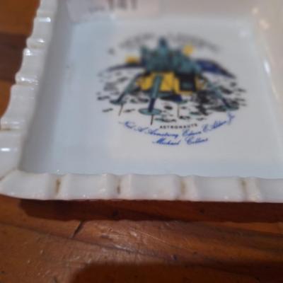 commemorative milk glass ashtray celebrating the first moon landing by Apollo 11 in July 1969. 