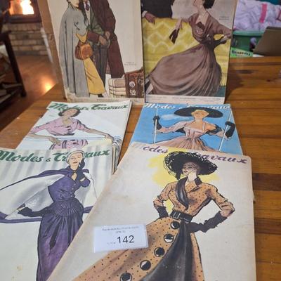 collection of vintage French fashion magazines titled Modes & Travaux.