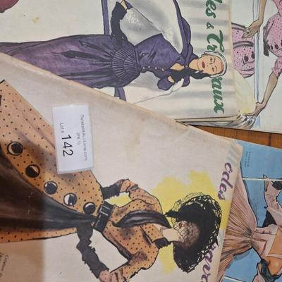 collection of vintage French fashion magazines titled Modes & Travaux.
