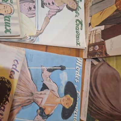 collection of vintage French fashion magazines titled Modes & Travaux.