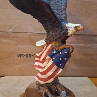 Resin statue of Bald Eagle and flag