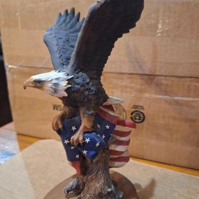 Resin statue of Bald Eagle and flag