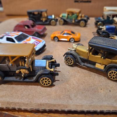 mixed lot fo pocket size cars, not hotwheels except the orange micro machine