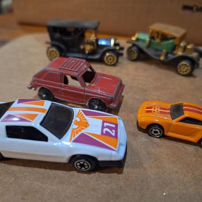 mixed lot fo pocket size cars, not hotwheels except the orange micro machine